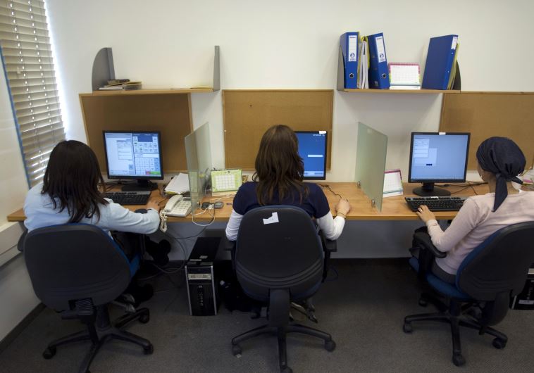 Ultra-Orthodox women work at Matrix Global, a hi-tech company, in the West Bank Jewish settlement of Modiin Illit April 3, 2011