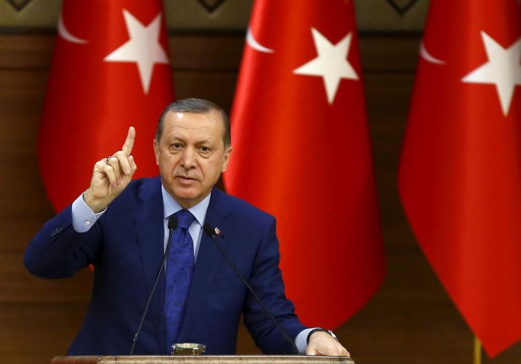 Turkish President Recep Tayyip Erdogan makes a speech at the Presidential Palace in Ankara