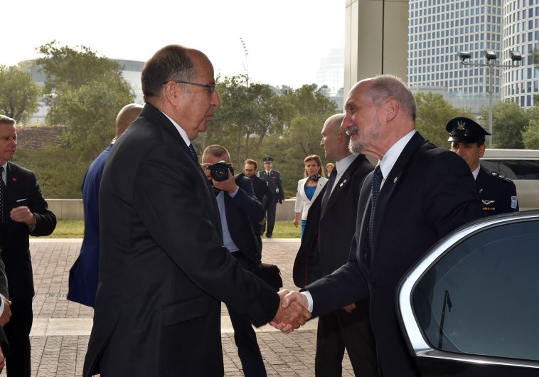 Defense Minister Moshe Ya'alon meets his Polish counterpart,  Antoni Macierewicz, in Tel Aviv on Wednesday.