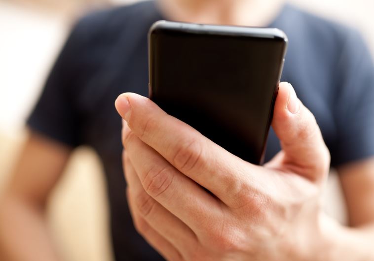 A man using mobile smartphone