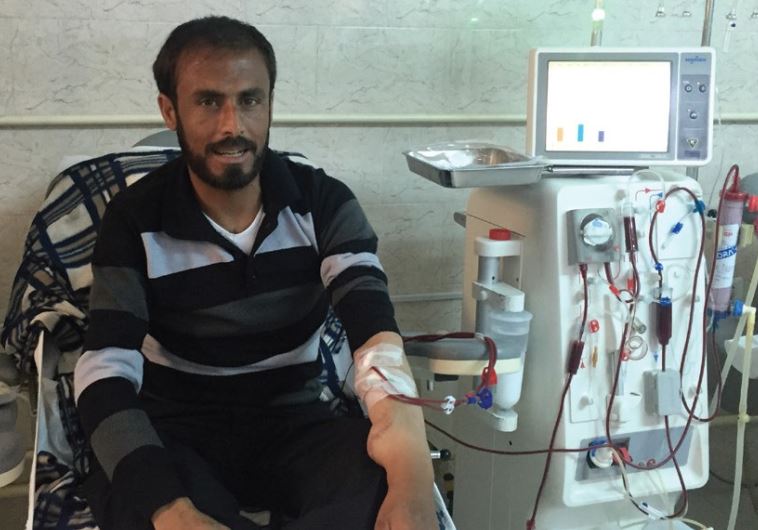 AHMED HAMZEH, a refugee from Deraa in Syria now living in Jordan’s Zaatari refugee camp, undergoes dialysis treatment yesterday at Irbid’s Islamic Hospital.