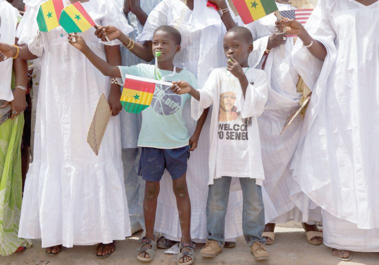 YOUNG SENEGALESE welcome US President Barack Obama to a school in Senegal in 2013