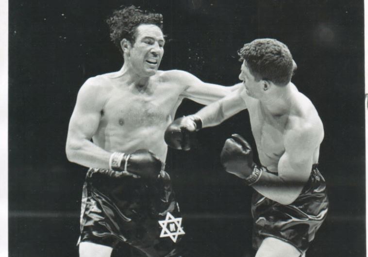Max Baer (left) takes on Lou Nova in a fight in 1939