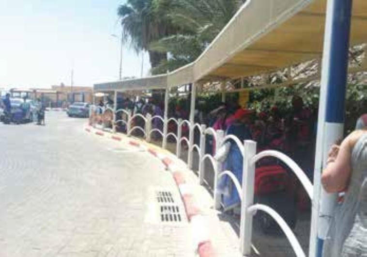 TOURISTS WAIT to enter Sinai at the Eilat-Taba border crossing