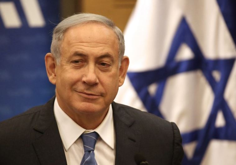 Prime Minister Benjamin Netanyahu talks during his Likud party meeting at the Knesset in Jerusalem