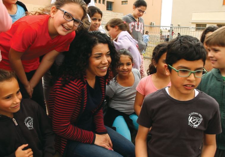 Wafa Hussein,a Muslim elementary school teacher of English and Arabic in a Jewish school in Safed who is loved by her Jewish students and strives for coexistence