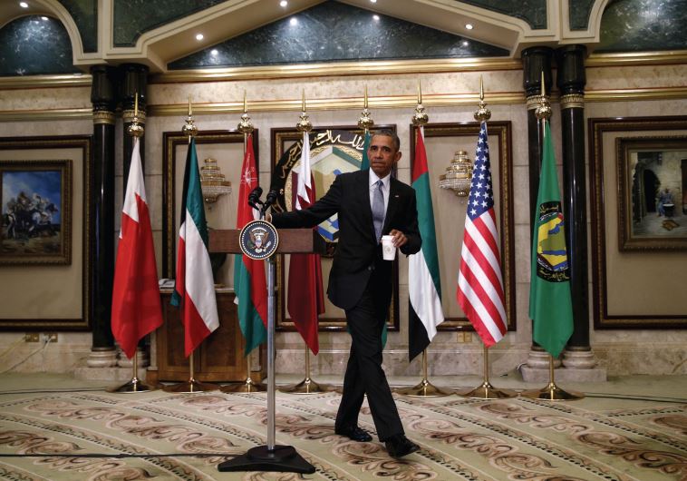 President Barack Obama walks from the rostrum after speaking at the Gulf Cooperation Council summit in Riyadh, Saudi Arabia, April 21