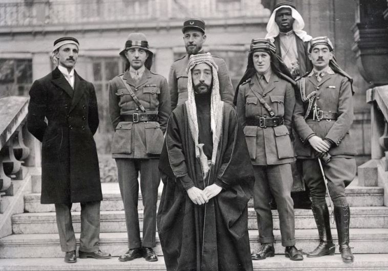 King Faisal I of Iraq leads a delegation at Versailles, during the Paris Peace Conference of 1919; on his right is Britain’s T. E. Lawrence