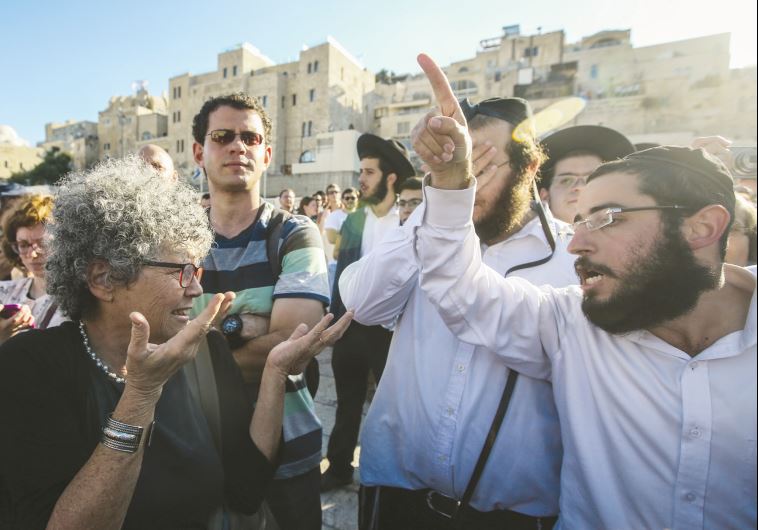 Conflict at the Kotel. Members of the Reform Movement clash with Orthodox worshipers at the Western Wall last week