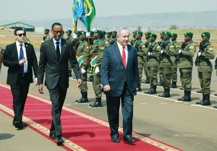 Prime Minister Benjamin Netanyahu walks alongside Rwandan President Paul Kagame in Kigali, Rwanda on July 6