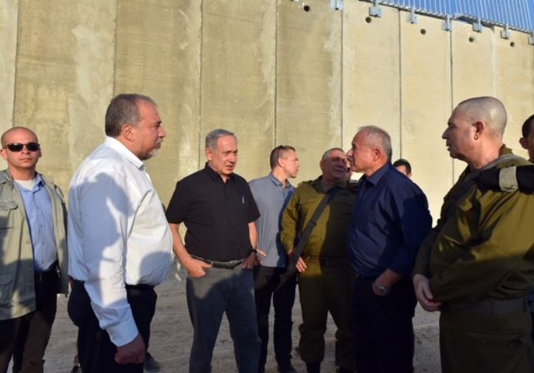 Prime Minister Benjamin Netanyahu and Defense Minister Avigdor Liberman at security barrier in Tarkumia