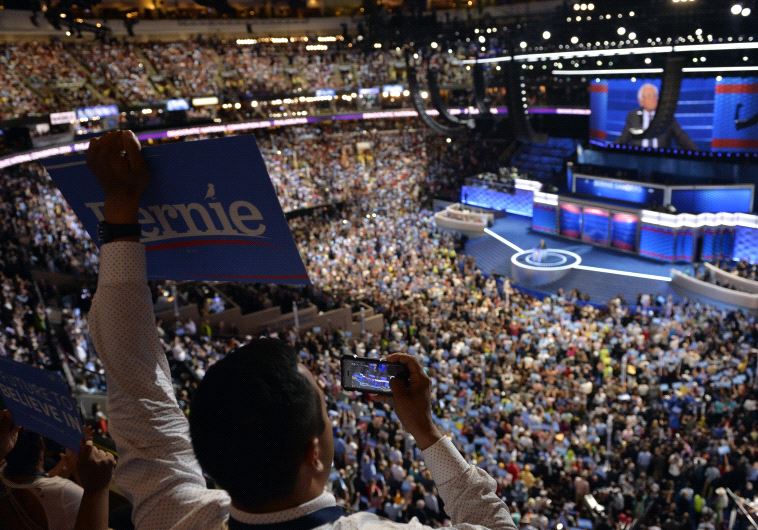 A delegate holds a Bernie Sanders sign during the Democratic National Convention in Philadelphia, Pennsylvania, US July 25, 2016