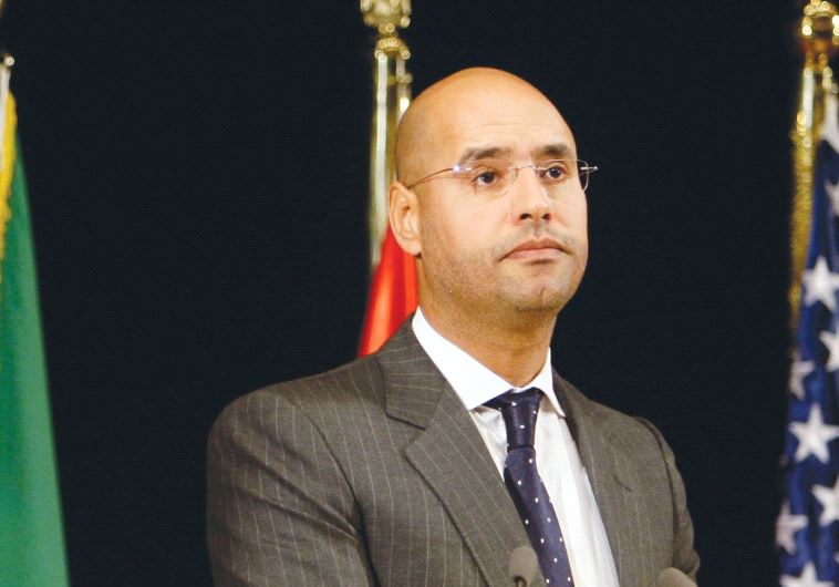 SAIF AL-ISLAM GADDAFI, son of Libyan leader Muammar Gaddafi and chairman of the Al Qaddafi International Foundation for Charity and Development, addresses students and staff at the American University in Cairo, in 2010.