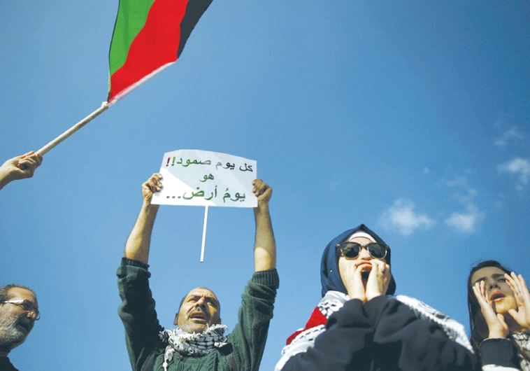 BEDUIN TAKE part in a rally marking Land Day in Umm al-Hiran in March.