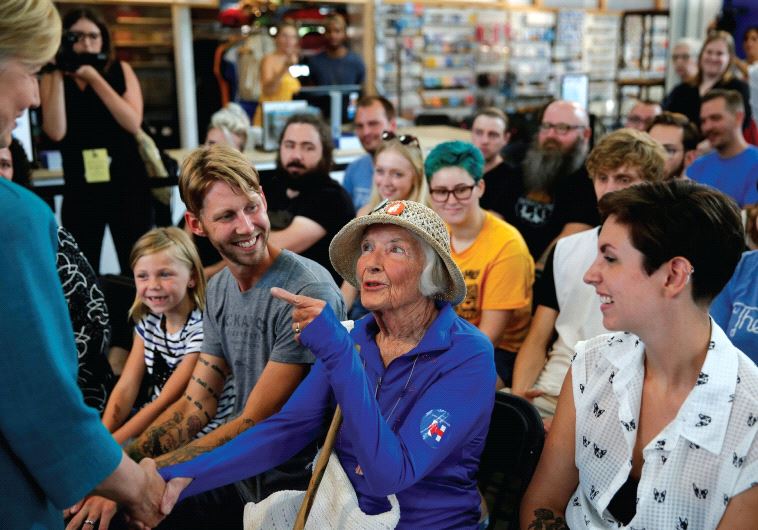 A WOMAN speaks with US Democratic presidential nominee Hillary Clinton earlier this week in Iowa.