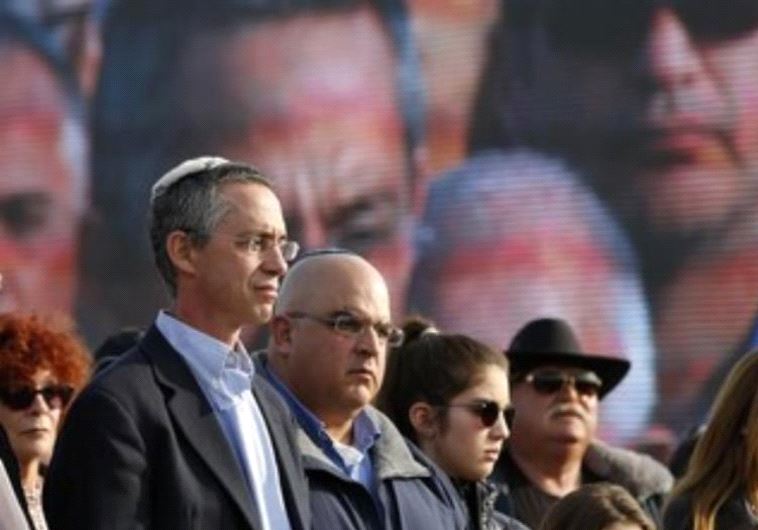 The sons of former prime minister Ariel Sharon, Gilad (L) and Omri (2nd L)