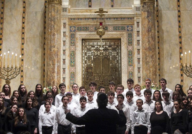 HaZamir International Jewish High School Choir sings at the Temple Emanu-El during the annual Holocaust Remembrance Day in New York April 7, 2013