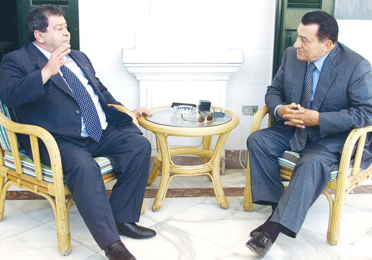 EGYPTIAN PRESIDENT Hosni Mubarak (right) listens to Labor Party head and defense minister Binyamin Ben-Eliezer during their meeting in Alexandria in July 2002.