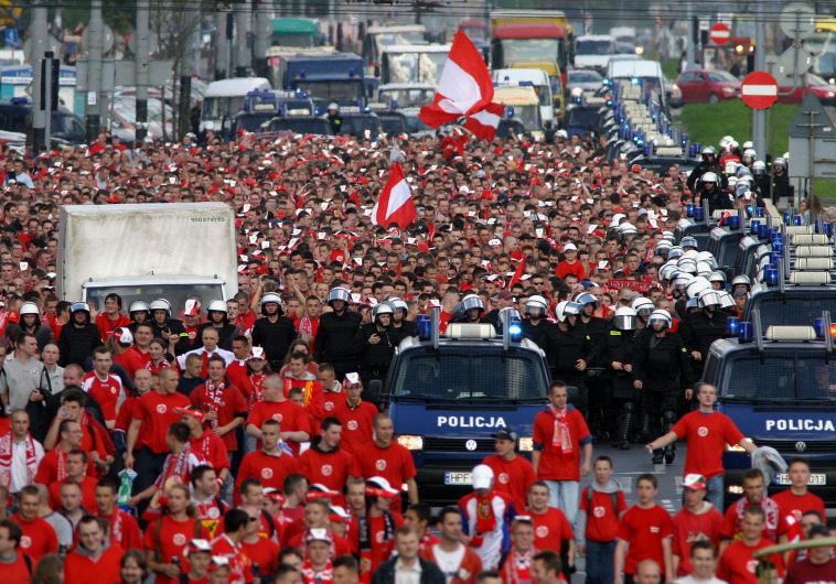 Polish soccer fans of the Widzew Lodz club escorted by police [File]