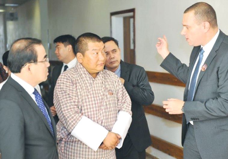 YARON TAMIR of Agrostudies speaks to Bhutanese Agriculture Minister Lyonpo Yeshey Dorji (center) and Cambodian Agriculture Minister Veng Sakhon in Jerusalem.