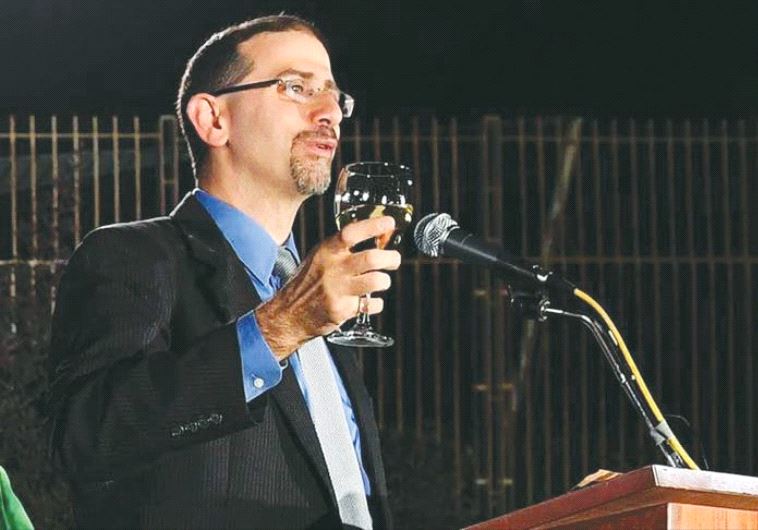 US AMBASSADOR Dan Shapiro toasts the New Year.