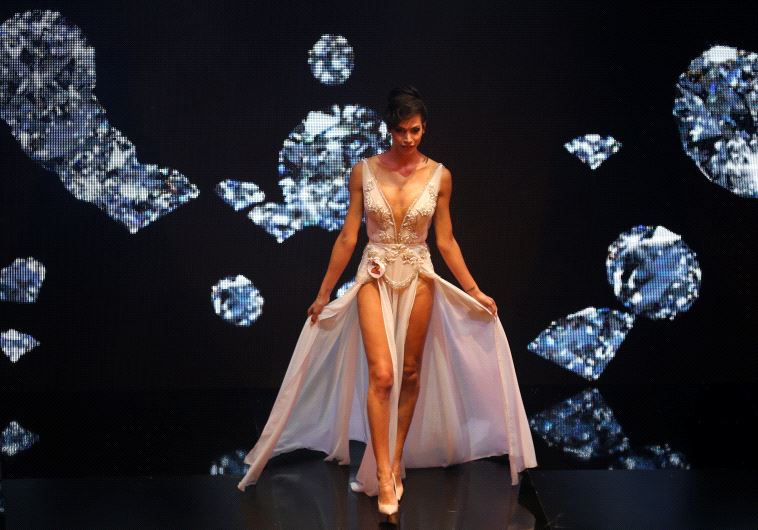 Talin Abu Hanah walks on stage.