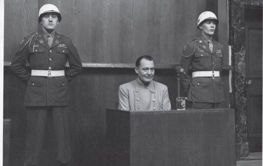 Hermann Goering, pictured at the 1945 Nuremberg Trials, was described by an American warden as a ‘simpering slob’