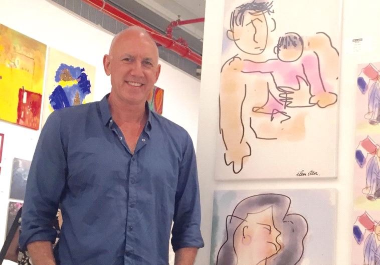 Ilan Starr with a few of his works