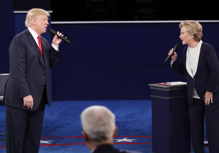DATE IMPORTED: October 10, 2016 Republican U.S. presidential nominee Donald Trump and Democratic U.S. presidential nominee Hillary Clinton speak during their presidential town hall debate at Washington University in St. Louis, Missouri, U.S., October 9, 2016. 