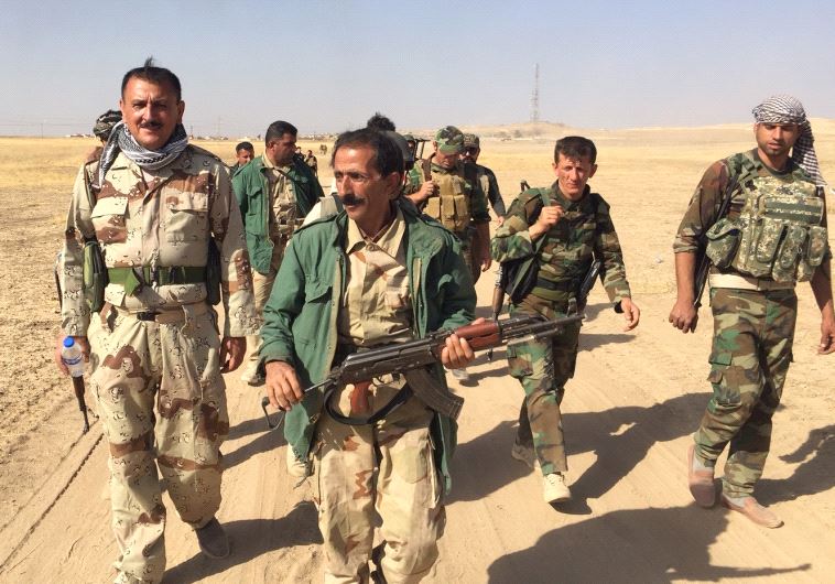 Kurdish peshmerga forces on the way to Mosul
