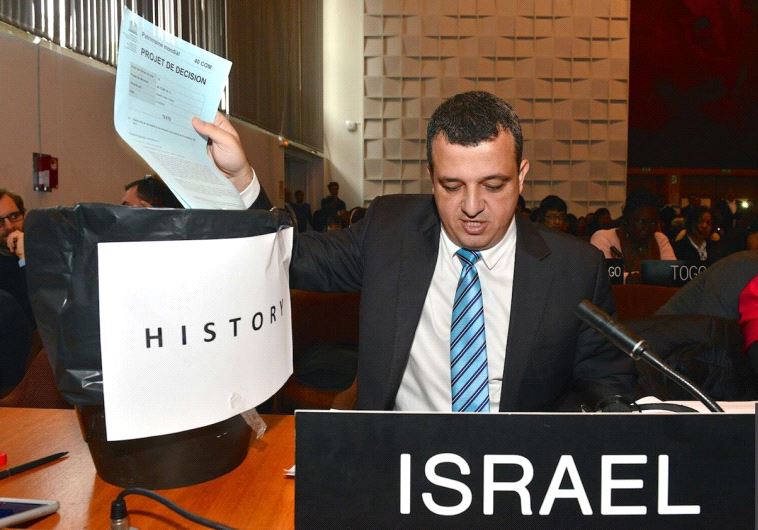 Israel's envoy to UNESCO Carmel Shama-Hacohen puts the resolution on Jerusalem in the trashbin of history