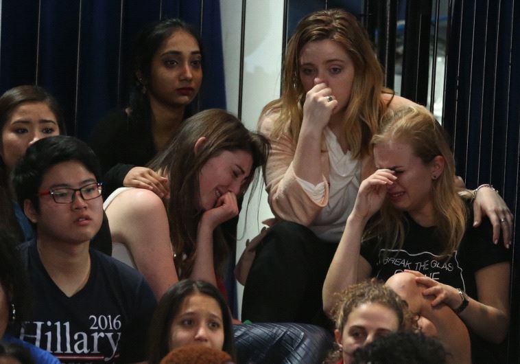 Supporters of US Democratic presidential nominee Hillary Clinton react at her election night rally in Manhattan, New York, US, November 8, 2016.