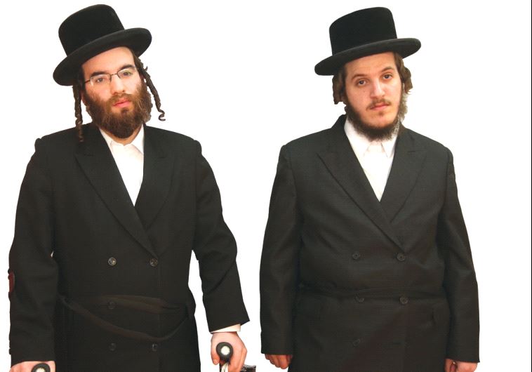 Chaim Winternitz and Menachem Farkash stand outside the OneFamily office in Jerusalem