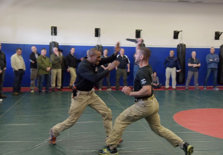 The delegation observes hand-to-hand combat drills at Jerusalem’s police academy