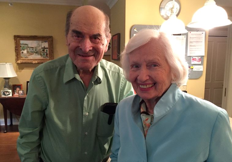 Dr. Henry Heimlich (L), the 96-year-old Cincinnati surgeon credited with inventing the life-saving technique named for him, poses with Patty Ris, 87.