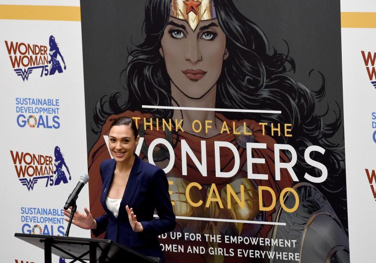 Actress Gal Gadot speaks during a ceremony as the UN names the comic character Wonder Woman its Honorary Ambassador for the Empowerment of Women and Girls during a ceremony at the United Nations Economic and Social Council Chamber on October 21, 2016, in New York