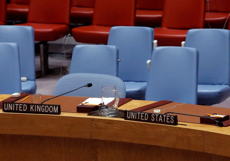 The seats of Britain and the United States sit empty in the United Nations Security Council chamber.