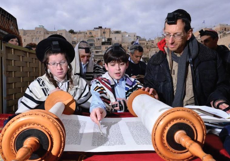 TZVI PERKAL with William Haberman and William’s father at the Western Wall.