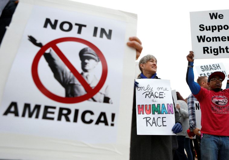 People protest on the day white nationalist leader Richard Spencer of the National Policy Institute is due to speak on campus at an event not sanctioned by the school, at Texas A&M University in College Station, Texas