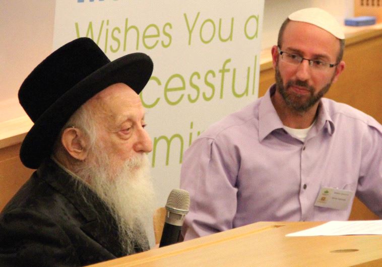 Rabbi Dr. Abraham J. Twerski (left) with Crossroads executive director Robbie Sassoon during the opening talk at the December 12 conference