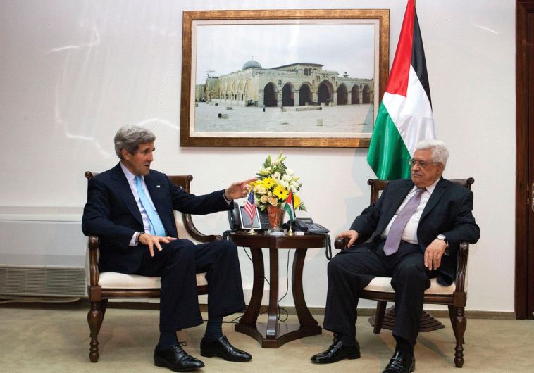 US SECRETARY of State John Kerry meets Palestinian Authority President Mahmoud Abbas in Ramallah in 2013.