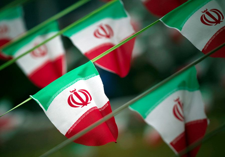 Iran's national flags are seen on a square in Tehran, Iran.