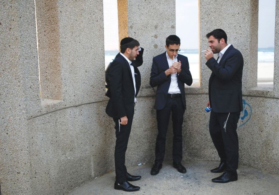 Young men smoking near Ashdod