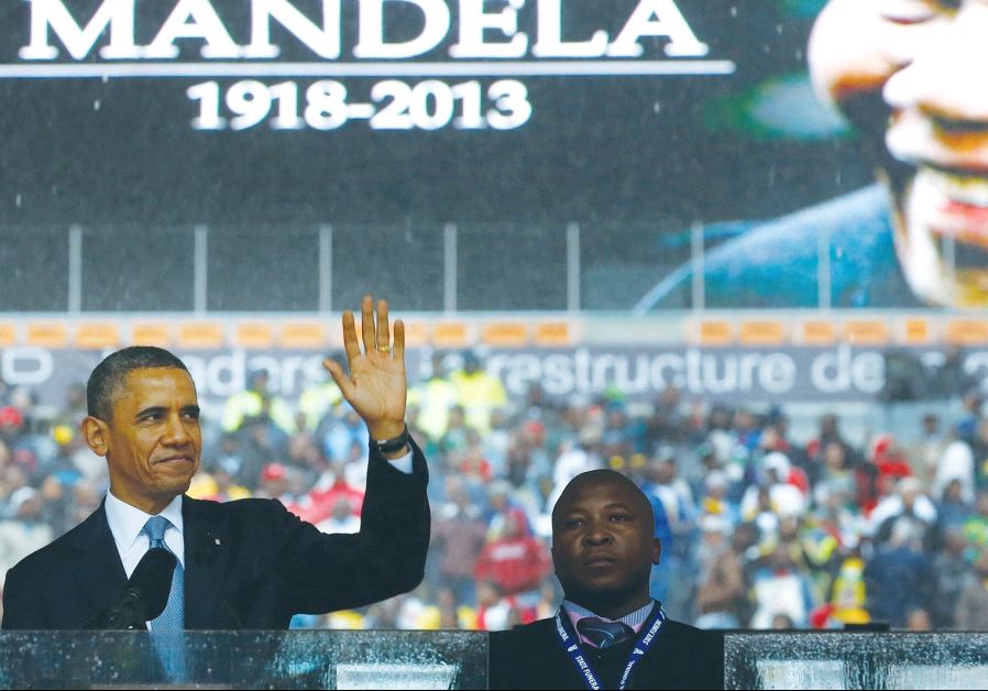 US PRESIDENT Barack Obama addresses the crowd during a memorial service for Nelson Mandela in Johannesburg, South Africa, in 2013.