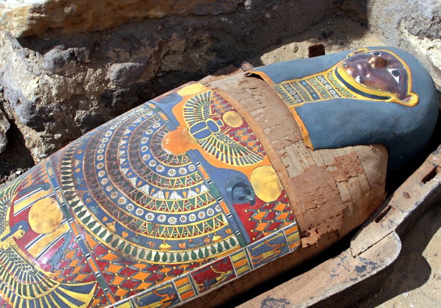 A 2,300-year old mummy is displayed after it was found by the Sakkara pyramids south of Cairo, May 3, 2005