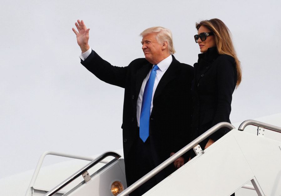 Donald Trump and his wife, Melania, arrive at Joint Base Andrews outside Washington