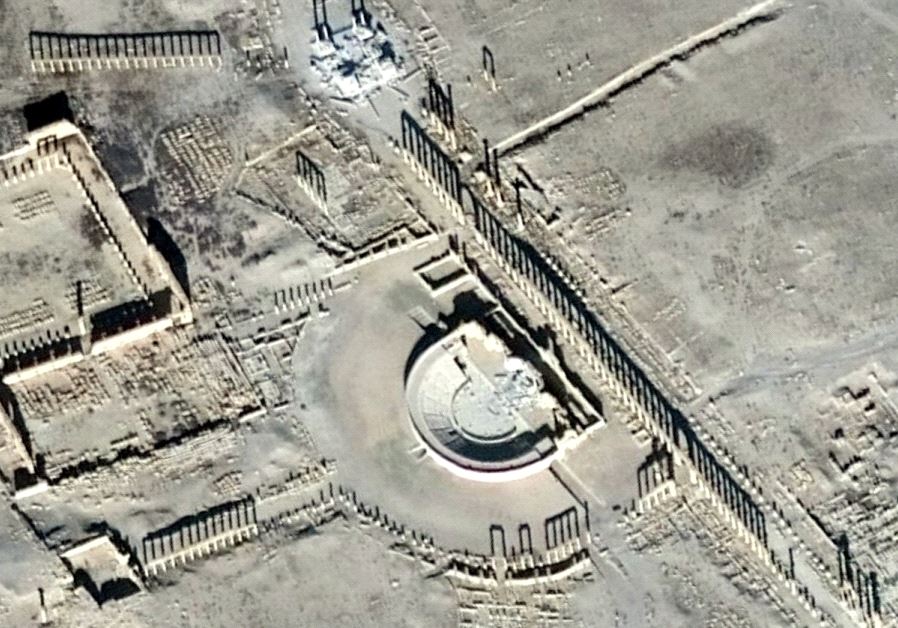 A satellite picture shows the damage in the Tetrapylon and the Roman Amphitheater in the historical city of Palmyra