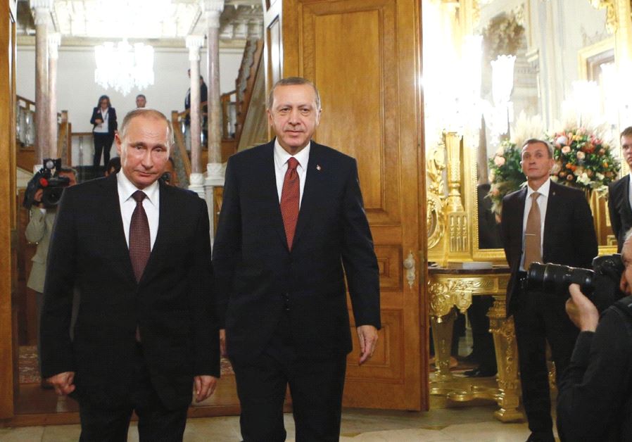 RUSSIAN PRESIDENT Vladimir Putin and his Turkish counterpart Tayyip Erdogan arrive for a joint news conference following their meeting in Istanbul, Turkey, last year.
