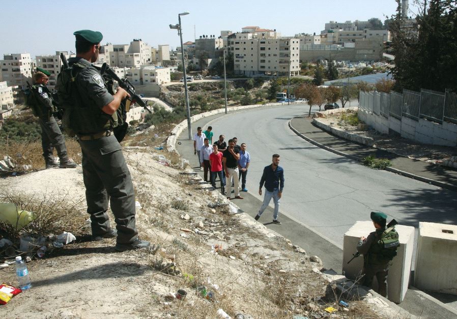 A checkpoint outside Isawiya