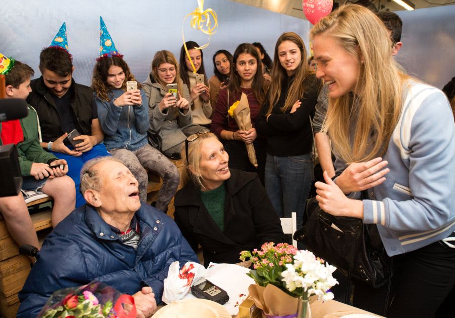 Holocaust survivor Ernest (left) celebrated his 92nd birthday with hundreds of guests, including supermodel Bar Refaeli (far right)